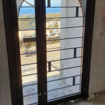 Μεταλλικες πορτες  ηλεκτροστατικα βαμμενες σε κατοικια στην Κέα